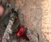 Ua pov Ukrainian soldier looks over a KIA Russian soldier that appears to have bled out. His tourniquet looks to still be tied to his armored vest. from fukiking time39 cringing kerala bled