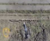Ukrainian drone dropped munition precisely hits a russian invader in a trench from russian mature 336