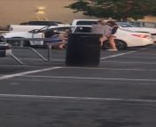 Girl pees in cup and pours it on car in parking lot from petite girl used in parking lot