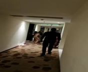 Naked woman randomly assaulting people in a hotel hallway from naked people in a beach