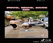 Policeman brutally slams a woman and a baby into ground in Shanghai, China. from woman and sexmade v